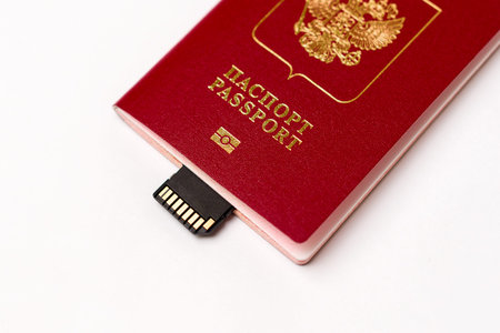 passport with a memory card embedded on a white background