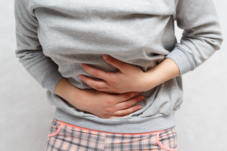 concept-abdominal pain. on a neutral backgroundの写真素材