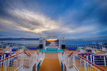 Cruise ship outdoor cinema. Sunrise and blue sky and clouds