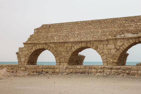 Ruined Roman aqueduct in Caesarea, Israel