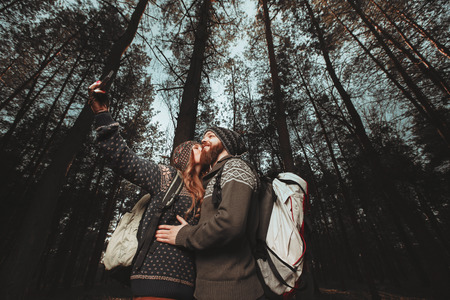 Happy young couple of tourists and taking selfieの写真素材