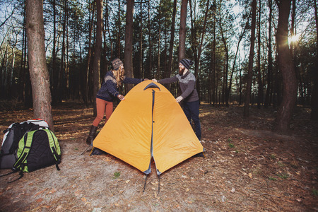 Couple tent camping in the wildernessの写真素材