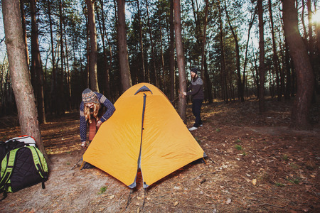 Couple tent camping in the wildernessの写真素材
