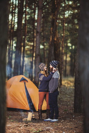 Couple tent camping in the wildernessの写真素材