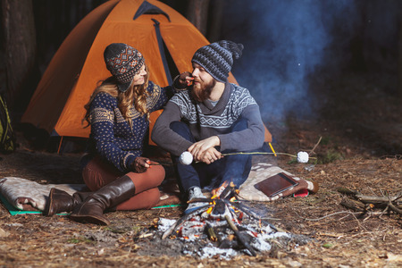 Couple tent camping in the wildernessの写真素材