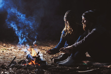 Couple tent camping in the wildernessの写真素材