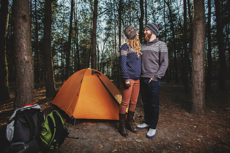 Couple tent camping in the wildernessの写真素材