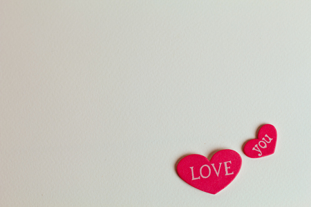 Beautiful red heart on a light background with free space for your textの写真素材