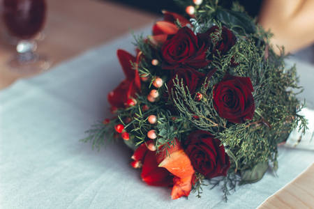 beautiful wedding bouquet of flowers is on the tableの写真素材