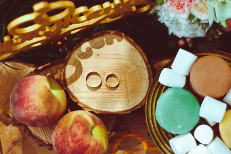 Beautiful engagement ring with marshmallows and biscuitsの写真素材