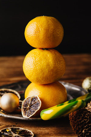 Beautiful Christmas background with Colorful candy and tangerinesの写真素材