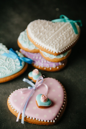 Beautiful background for Valentine's day with gingerbread heartsの写真素材