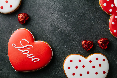 Beautiful background for Valentine's day with gingerbread heartsの写真素材