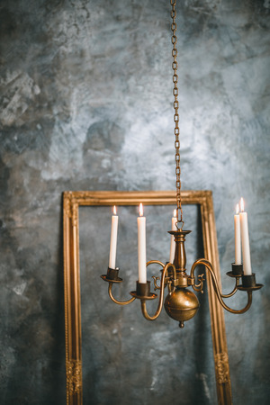Romantic interior for Valentine's day with candles lights burning in room. の写真素材
