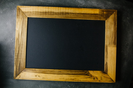 Wooden frame mock-up on black background.の写真素材