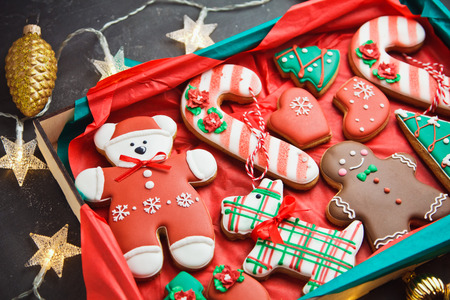 Beautiful Christmas gingerbreads with decor and garland on New Year background. Merry Christmas postcardの写真素材