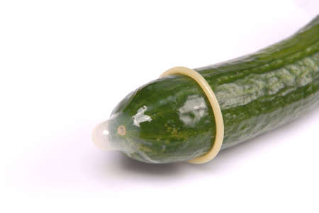 cucumber with condom - safe symbolの写真素材
