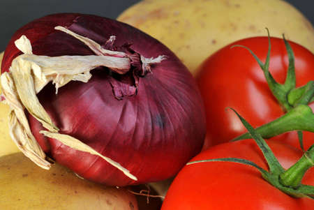 fresh onion tomatoes and potatoesの写真素材