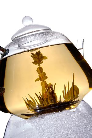 Fragrant green flower tea in teapotの写真素材
