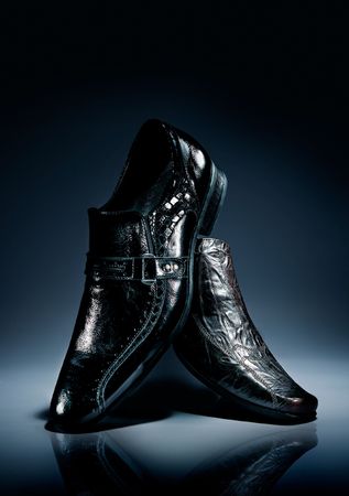 Shoes against a dark backgroundの写真素材