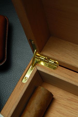 Cigarette case from a wood and a cigarの写真素材