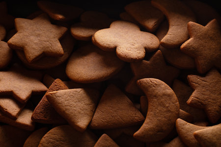 Homemade tasty gingerbread cookies background, close-up shoot.の写真素材