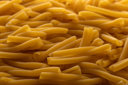 Uncooked Casarecce Pasta, Close-Up View of Italian Food Texture