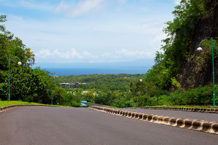 Empty road and views of the tropical islandの写真素材
