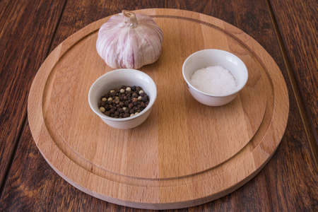 Garlic and spices (pepper and salt)の写真素材