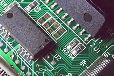 Green board with chips and components for surface and hinged installation.