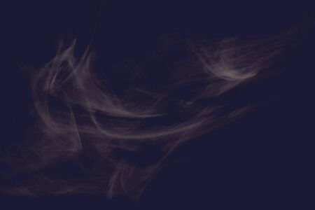 Curls and clouds of colored smoke float against a colored dark background.の写真素材