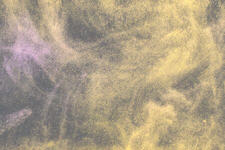 Dance of small gas bubbles in a colored liquid. Bubbles of gas in the wine. Carbonated Christmas drink. Nebula, star cluster in the dark sky.の写真素材