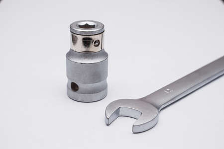 Wrenches close-up on a white background. Chrome plated wrenches. Wrenches of different sizes and types.の写真素材