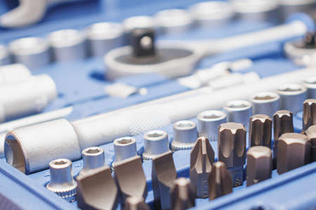 Close-up wrenches in a tool case. Chrome plated wrenches. Wrenches of different sizes and types.の写真素材