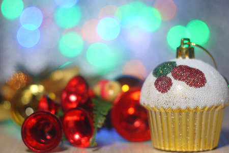 Merry christmas and a happy new year! The atmosphere of the winter holidays. Christmas decorations on the background of a blinking garland.の写真素材