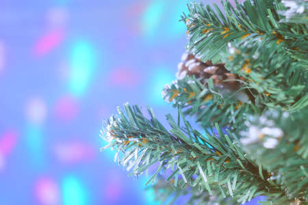Merry christmas and a happy new year! The atmosphere of the winter holidays. Christmas decorations on the background of a blinking garland.の写真素材