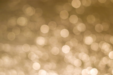 Abstract background obtained from crumpled foil with moving lighting and a defocused camera....