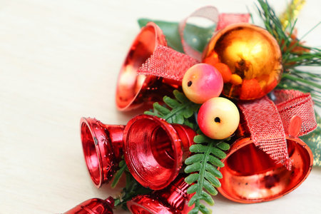 Merry christmas and a happy new year! Bright holiday decorations close-up. Plastic bells and pine...