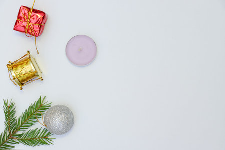 Merry christmas and a happy new year! Greeting card with attributes of the winter holidays on a plain background and free space for an inscription.の写真素材