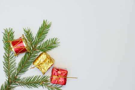 Merry christmas and a happy new year! Greeting card with attributes of the winter holidays on a plain background and free space for an inscription.の写真素材