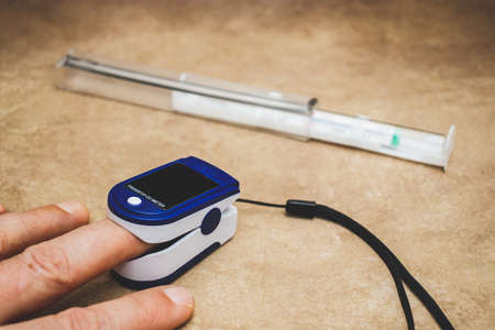 Small digital device for measuring pulse and bloodの写真素材