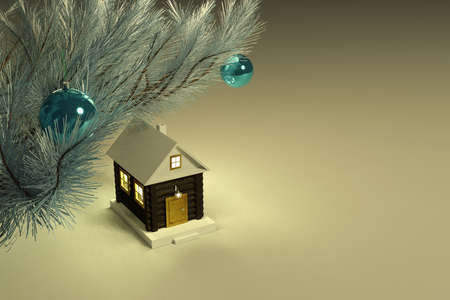 Christmas decoration in the form of a house with a snow-covered roof.の写真素材
