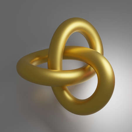 A gold wire tied in a knot on a gray background.の写真素材