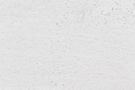 The texture of the whitewashed plaster is close-up.の写真素材