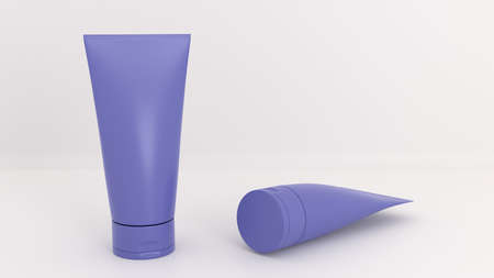 Tubes for cosmetics for product presentation. Two blue tubes without logos and inscriptions on a gray background. 3D rendering.の写真素材