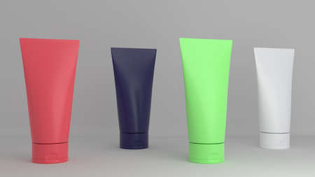 Tubes for cosmetics for product presentation. Pink, blue, green and gray tubes without logos and inscriptions on a gray background. 3D rendering.の写真素材