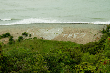 the inscription on the beach I love you by the seaの写真素材