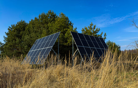 Solar panels in the field. Photovoltaic modules for renewable energy.