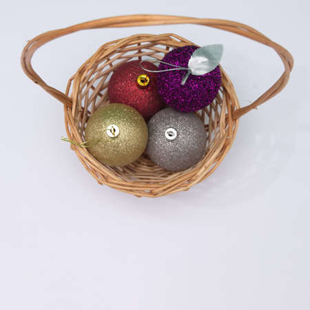 Basket with New Year's decorations on a white background. New Year's scene.の写真素材