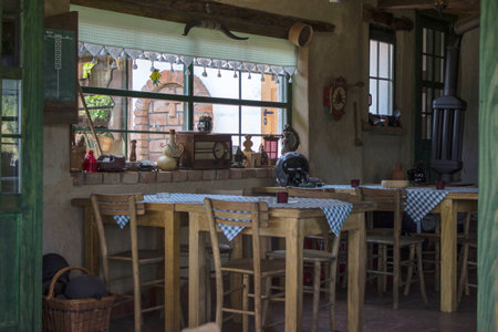 A rustic dining space with wooden furniture.の写真素材